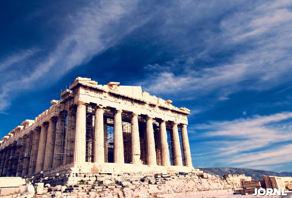 Ancient Parthenon in Acropolis Athens Greece on blue sky background